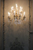 gold and white uplight chandelier
