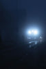 black car on road during night time