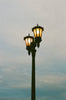 black street light under gray sky