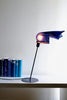 a lamp that is on top of a table