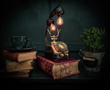a table topped with books and a telephone