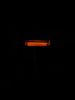 a black background with a red light in the dark