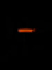 a black background with a red light in the dark