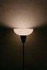 a lamp that is lit up in the dark