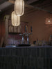 Beer taps and glasses on a bar counter
