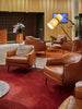 Lobby with leather chairs and modern floor lamp