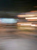 a blurry photo of a person riding a skateboard