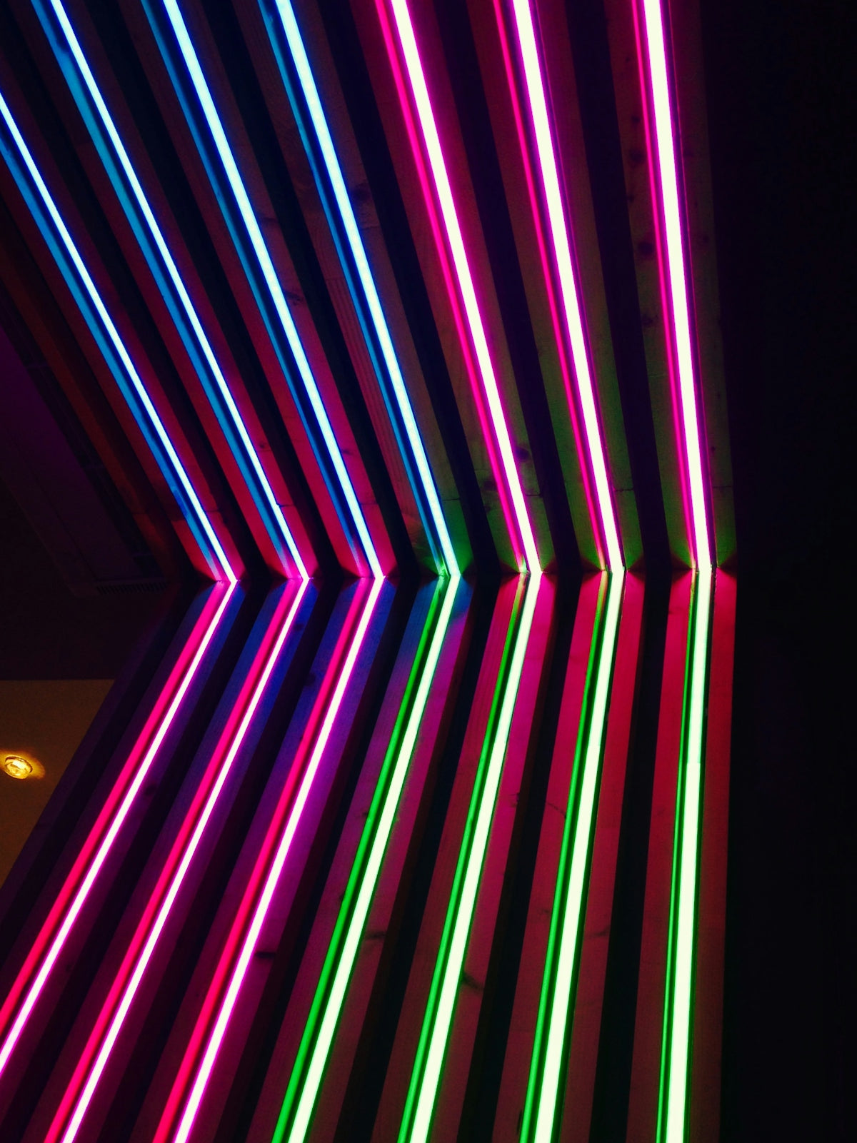turned on green, purple, and blue neon lights