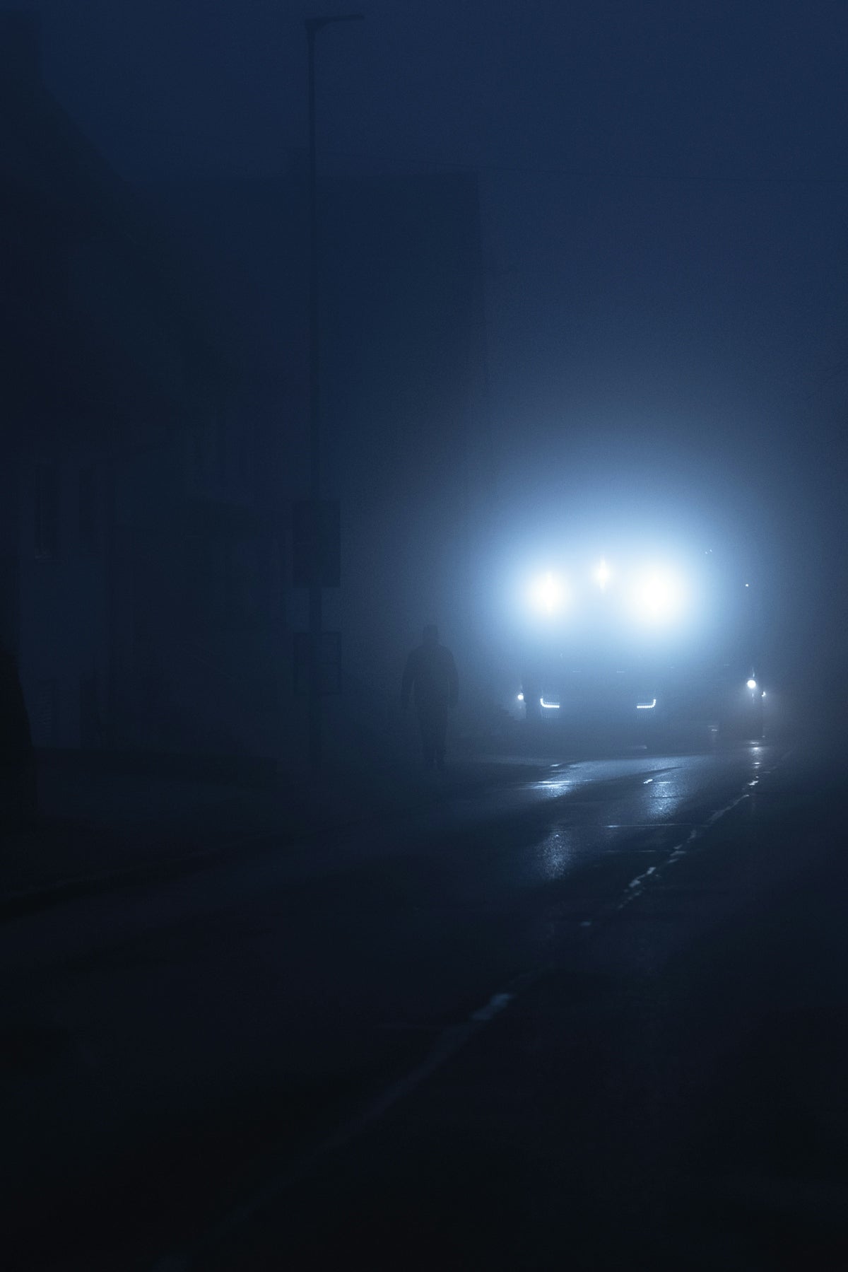 black car on road during night time