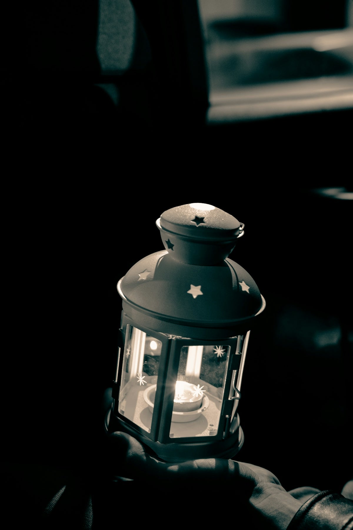 black lantern in black background