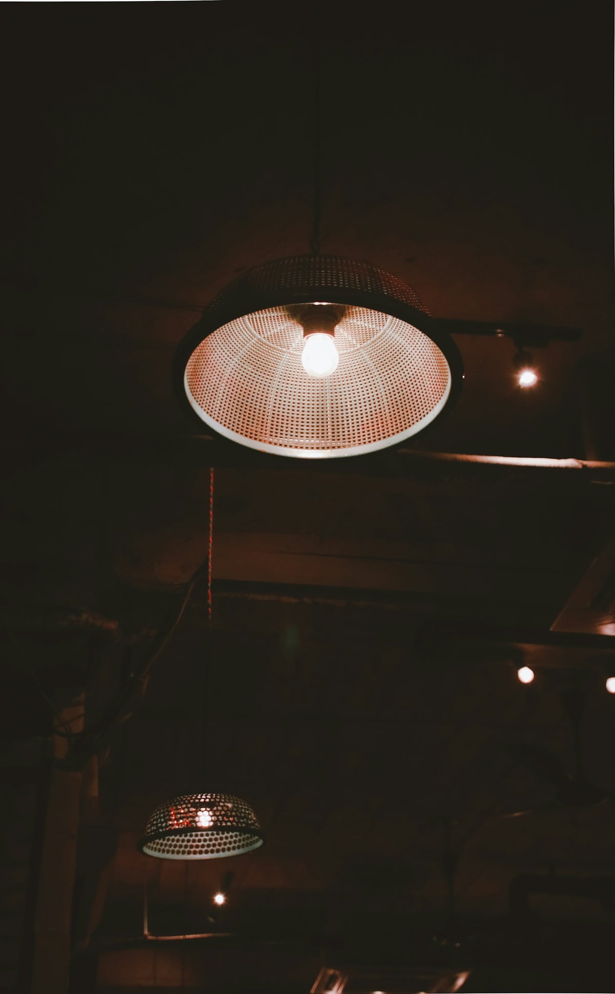 white pendant lamp turned on during nighttime