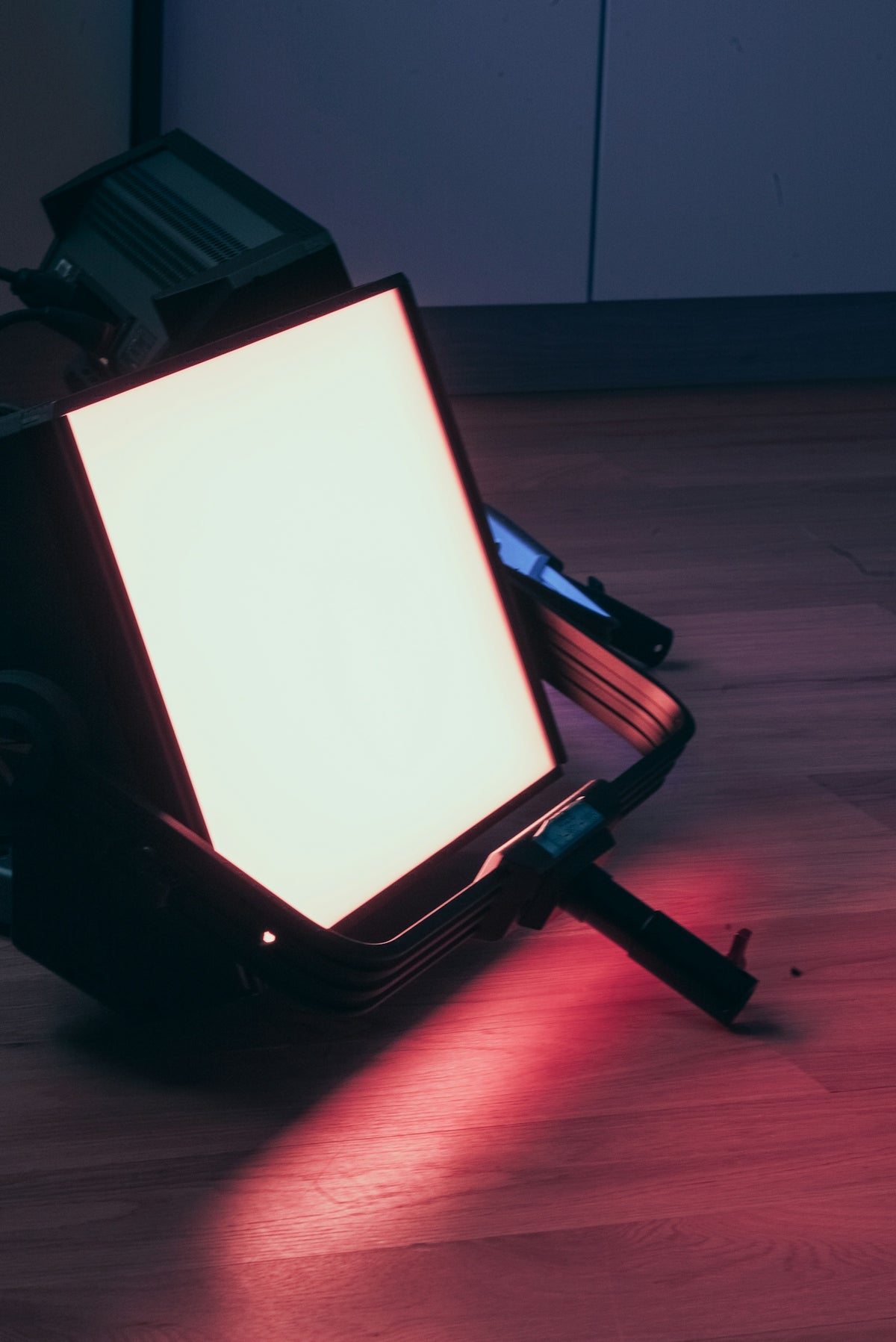 a light that is sitting on a wooden floor