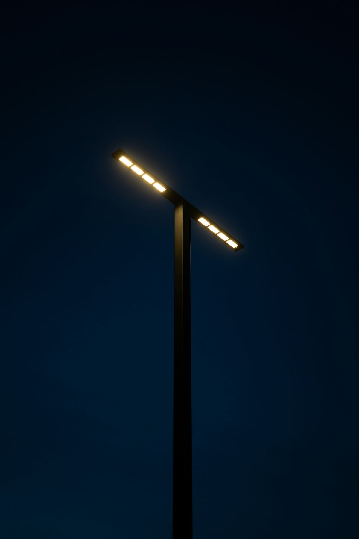 a street light is lit up at night