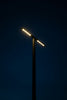 a street light is lit up at night