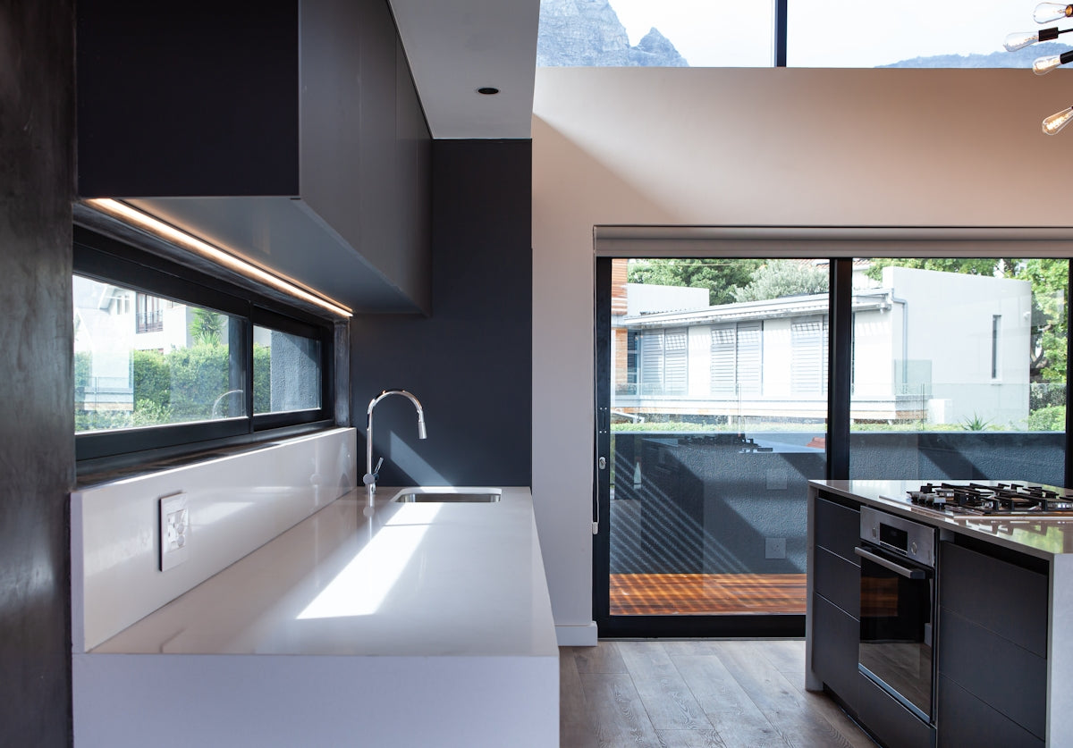 a kitchen with a large window