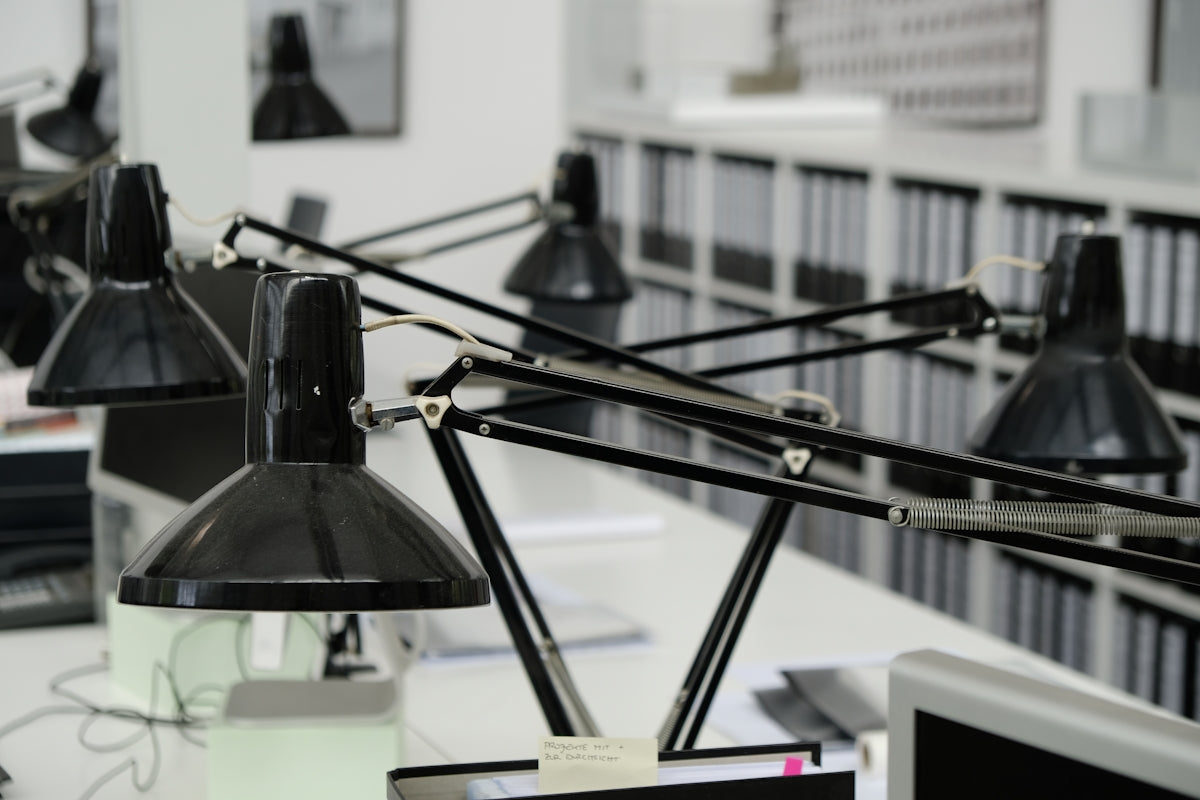 a desk with a bunch of lights hanging from it