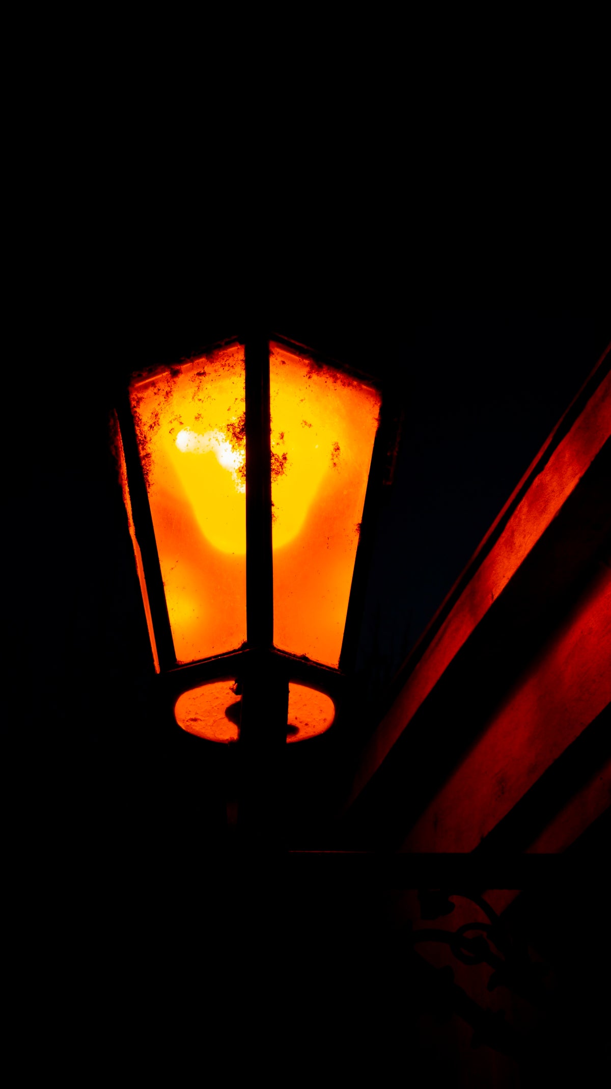 a street lamp lit up in the dark