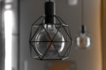 a light bulb with a clock inside of it