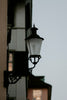 a street light hanging off the side of a building