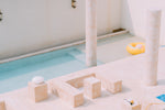 A bath room with a sink and a bath tub