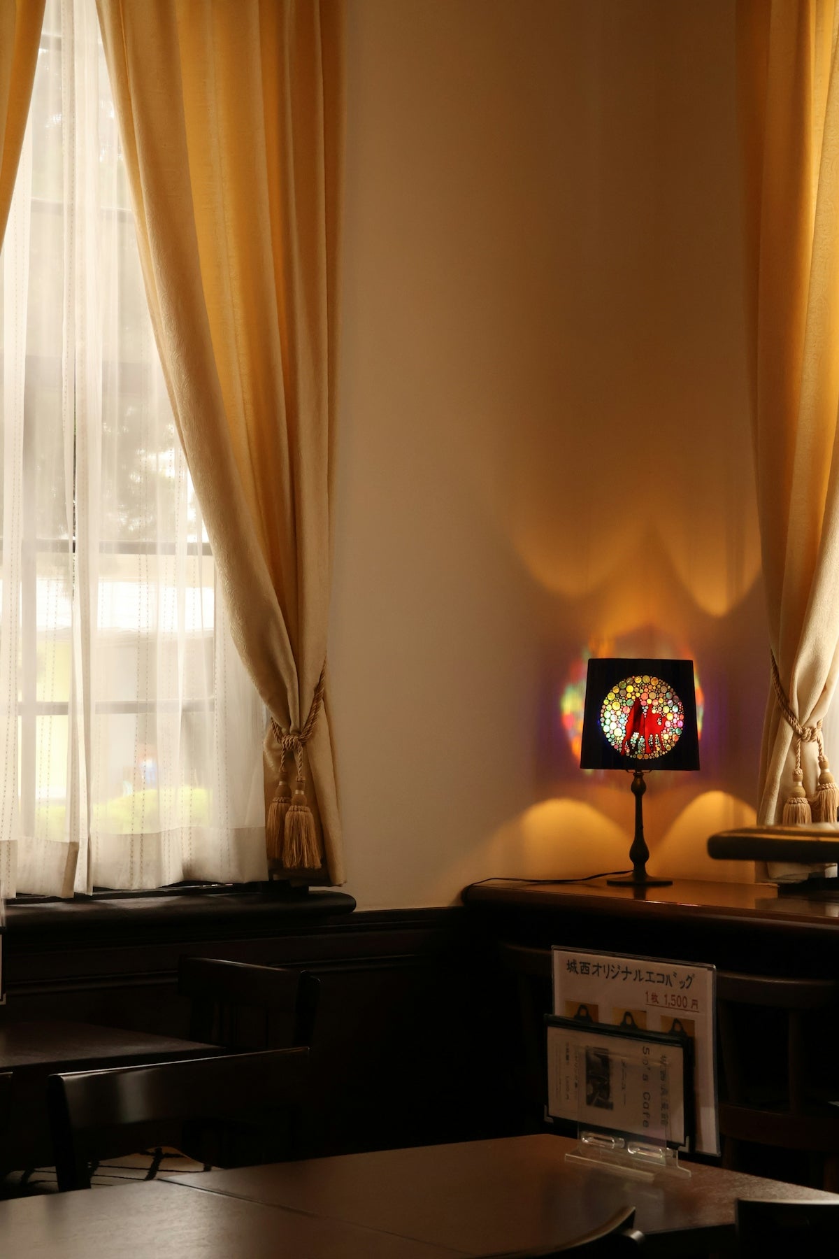 A dimly lit room with a clock on the wall