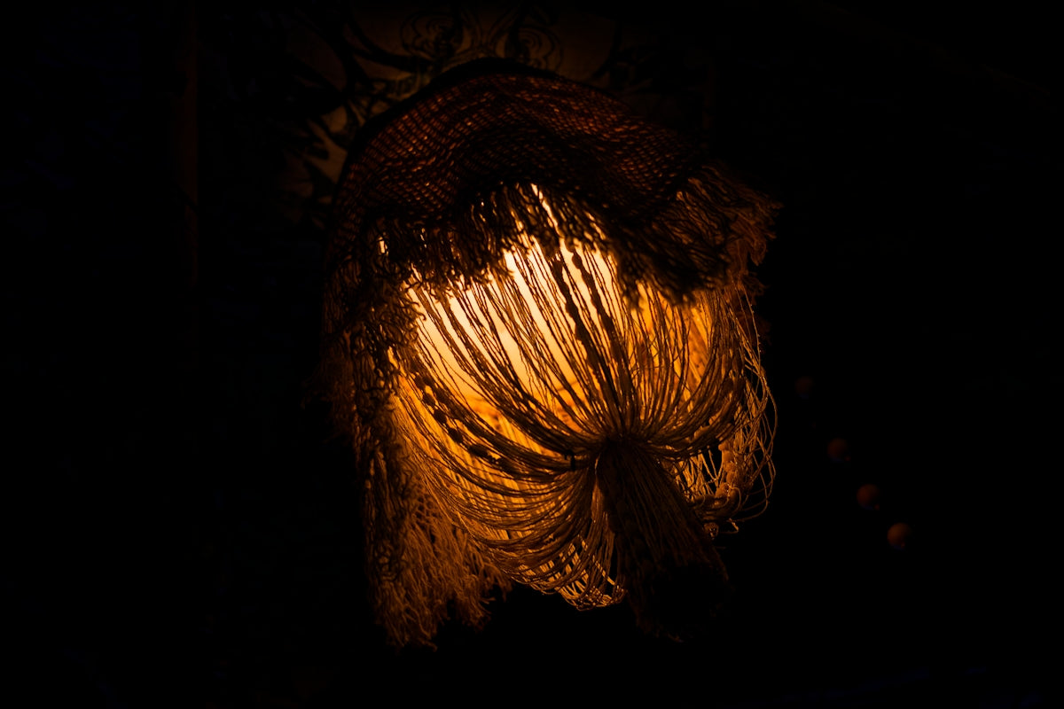 A close up of a person's head in the dark