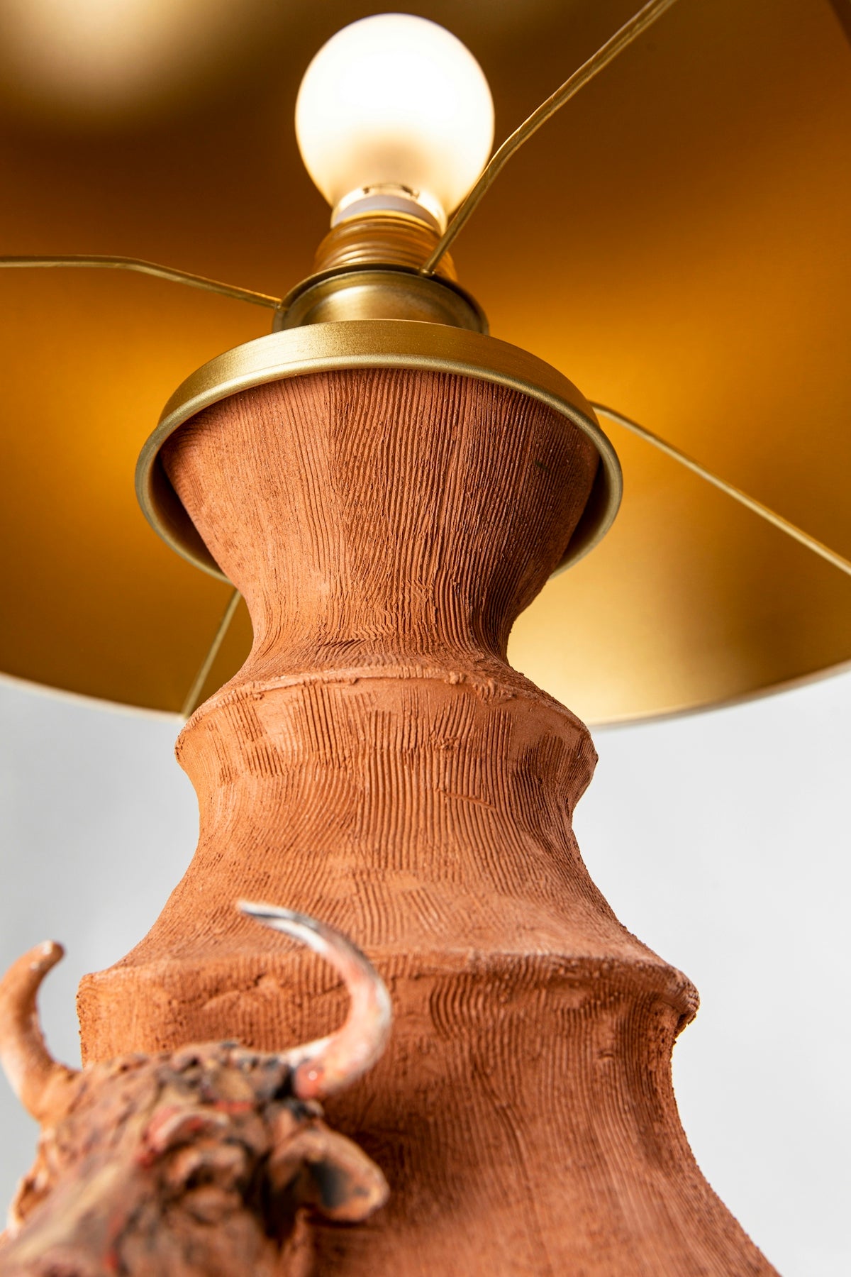 A close up of a lamp on a table