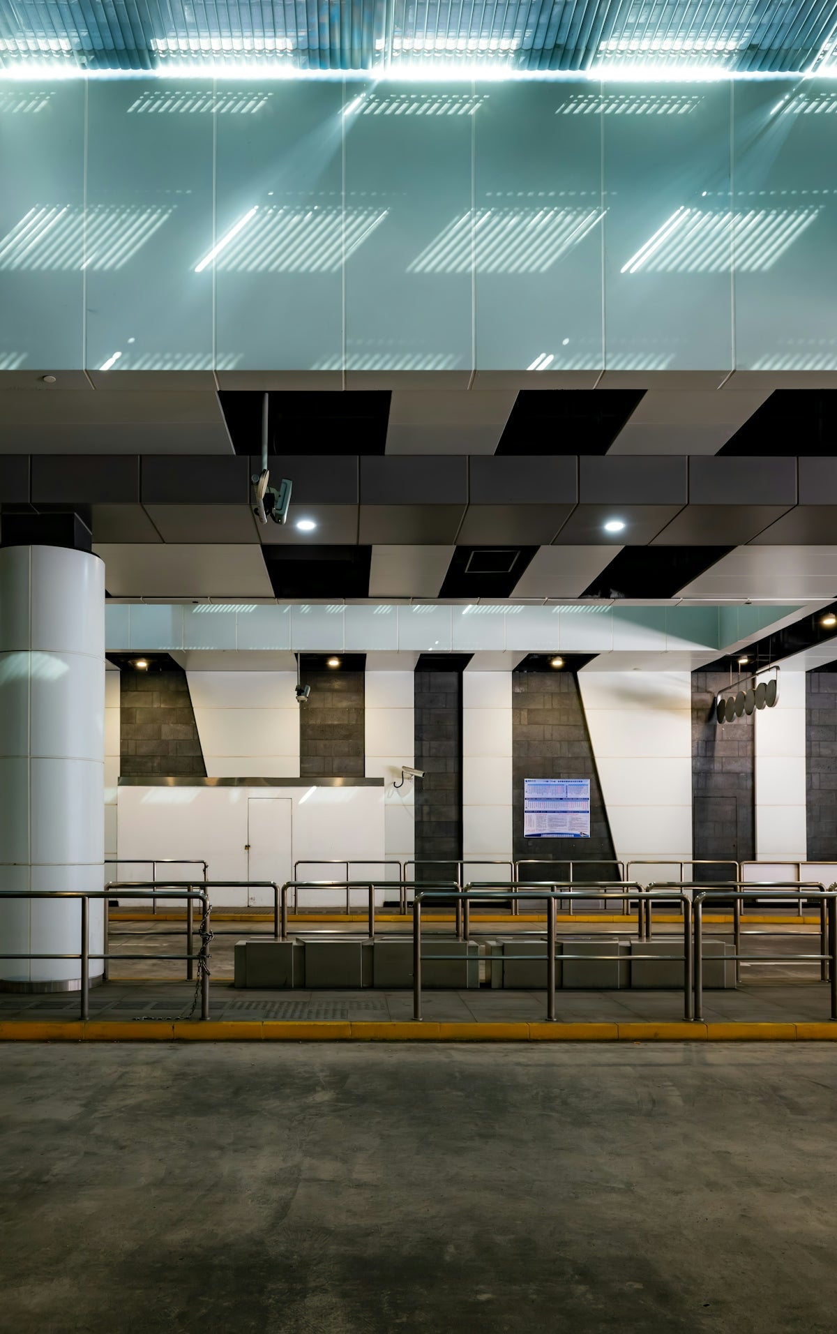 An empty parking garage with a lot of lights