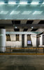 An empty parking garage with a lot of lights