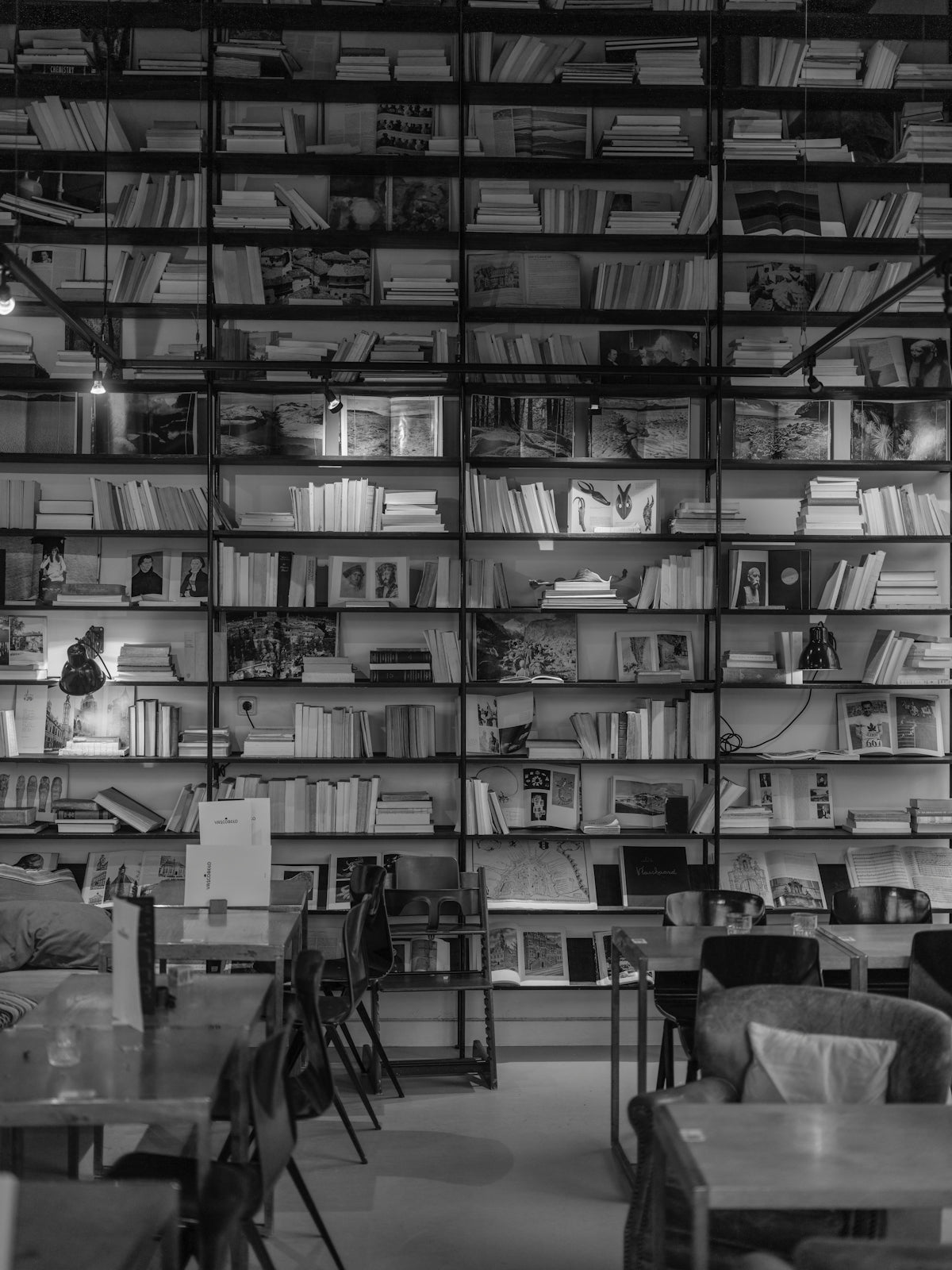 Bookshelves filled with numerous books and photos.
