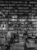 Bookshelves filled with numerous books and photos.