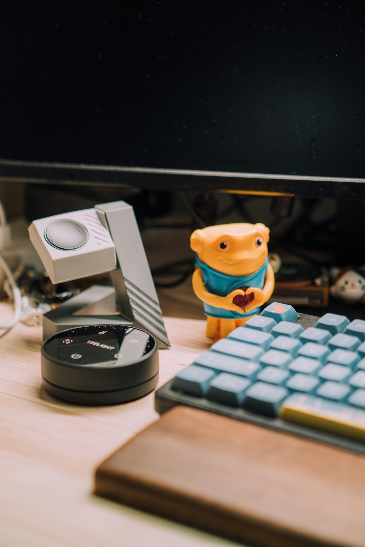 Desk setup with accessories and a keyboard.
