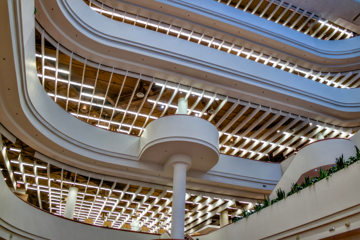 Modern building interior with curved balconies and atrium