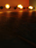 String of warm lights blurred in background