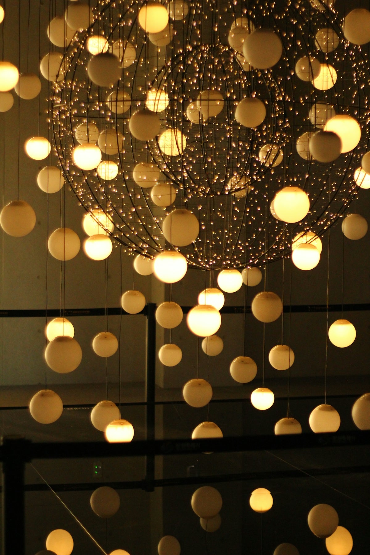 Modern spherical light fixture with many small bulbs