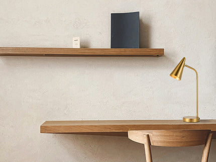 Isolde Table Lamp with Adjustable Shade and Modern Brass Finish.