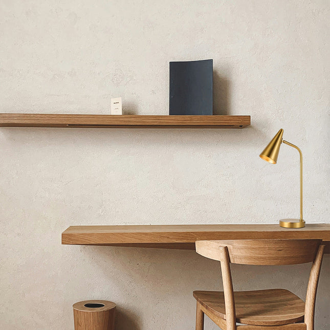 Isolde Table Lamp with Adjustable Shade and Modern Brass Finish.