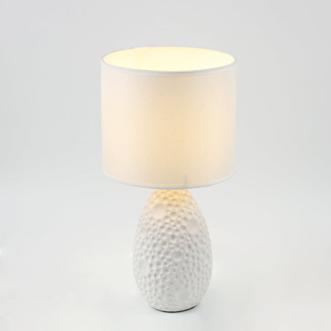 Hass Ceramic Table Lamp with Modern Geometric Design.