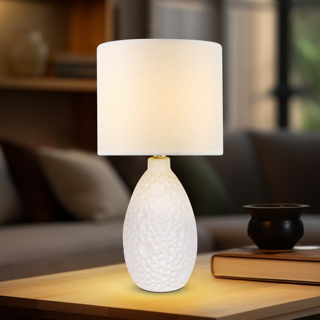 Hass Ceramic Table Lamp with Modern Geometric Design.