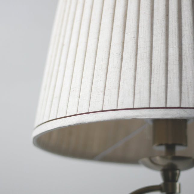Nicollete Floor Lamp with Brass Stand and Fabric Shade.