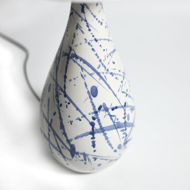 Ashleigh Table Lamp with Blue Ink Splash Ceramic Base and Linen Shade.
