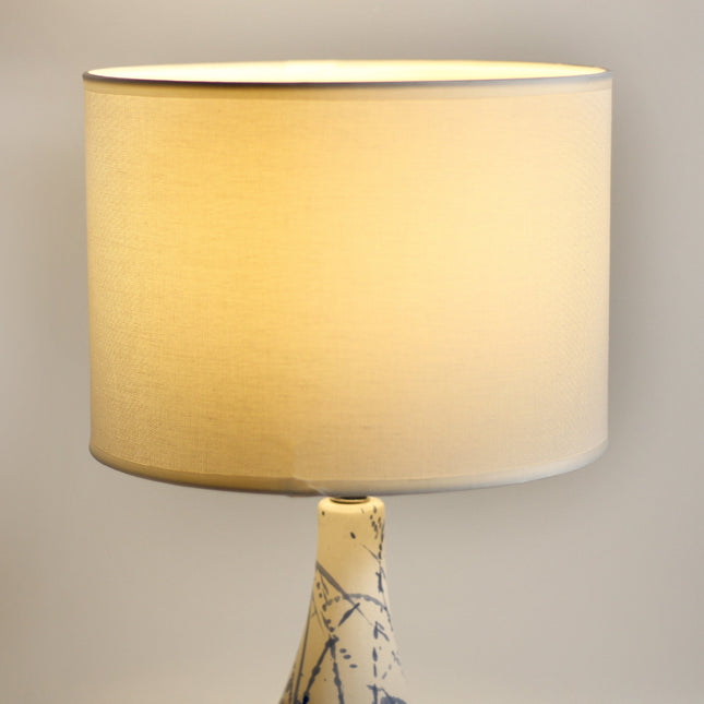 Ashleigh Table Lamp with Blue Ink Splash Ceramic Base and Linen Shade.
