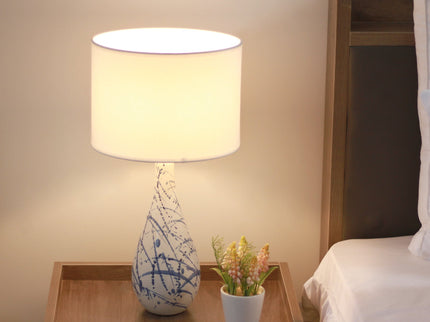 Ashleigh Table Lamp with Blue Ink Splash Ceramic Base and Linen Shade.