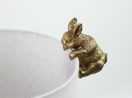 Two Rabbits Playing Table Lamp with Gold Base and White Fabric Shade.