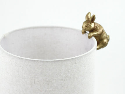 Two Rabbits Playing Table Lamp with Gold Base and White Fabric Shade.