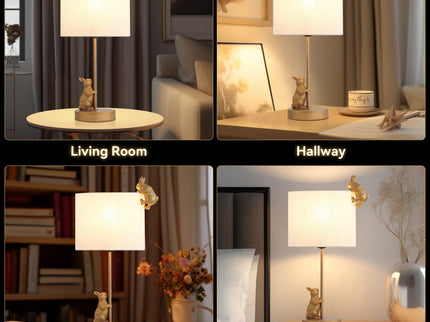 Two Rabbits Playing Table Lamp with Gold Base and White Fabric Shade.