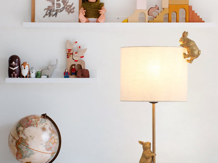 Two Rabbits Playing Table Lamp with Gold Base and White Fabric Shade.