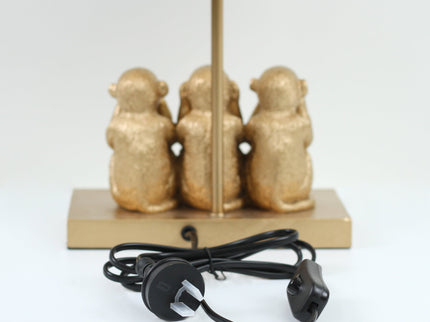 Three Wise Monkeys Table Lamp with Black Shade and Iron Base.
