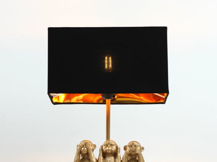 Three Wise Monkeys Table Lamp with Black Shade and Iron Base.