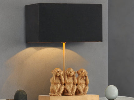 Three Wise Monkeys Table Lamp with Black Shade and Iron Base.